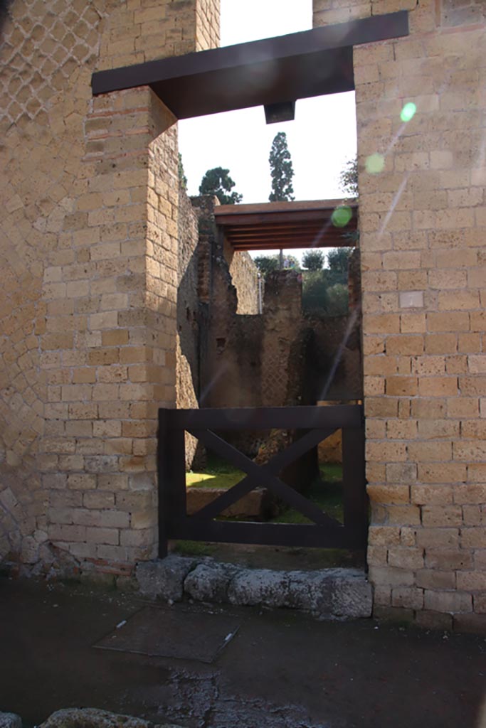 Ins. Orientalis II.7, Herculaneum. October 2022.
Looking east through entrance doorway. Photo courtesy of Klaus Heese.